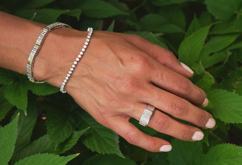 woman showing off holiday party jewelry
