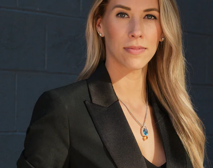 woman wearing mixed metal jewelry