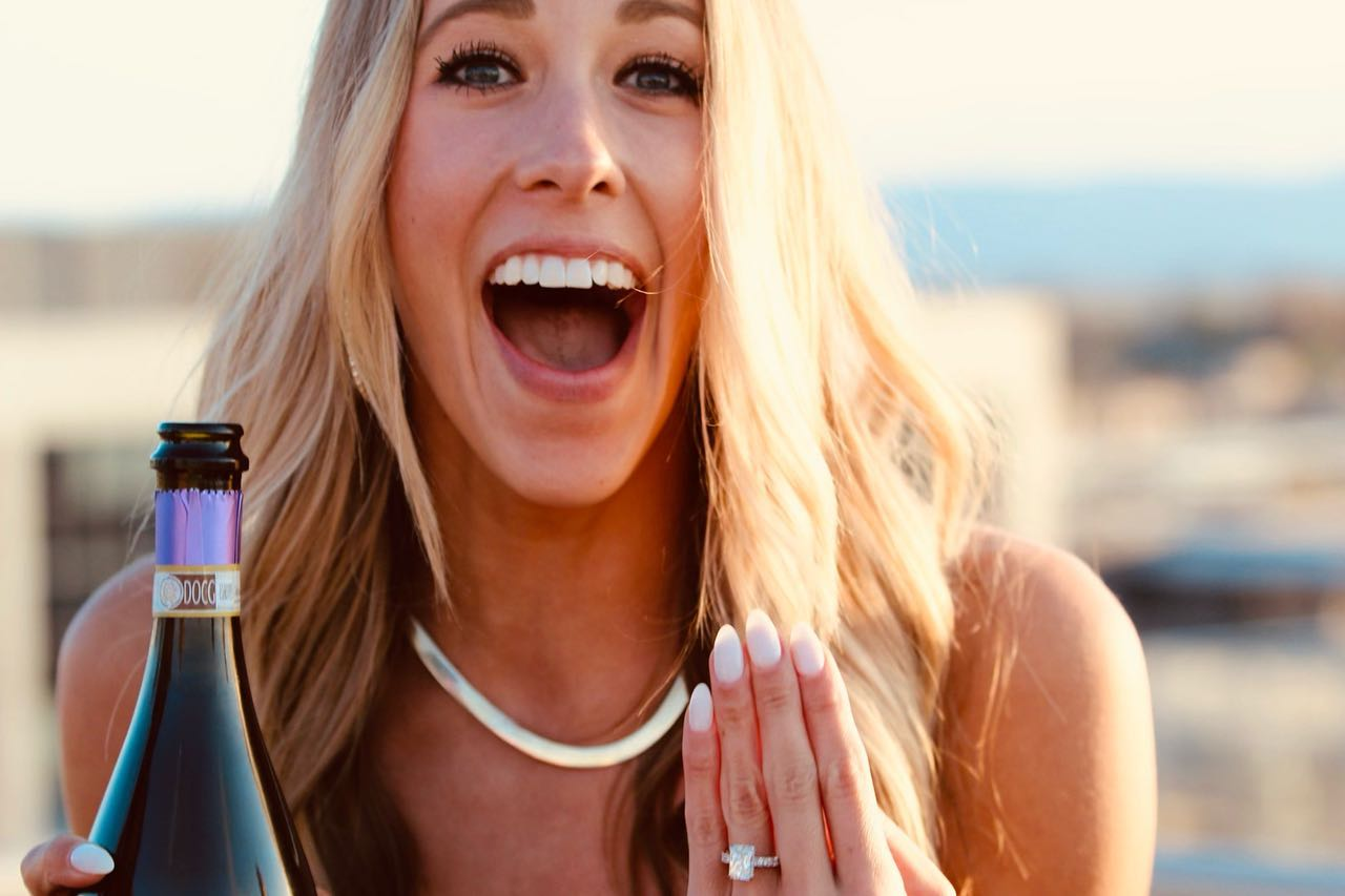 Woman Happy and Showing her Hand with Ring on Finger